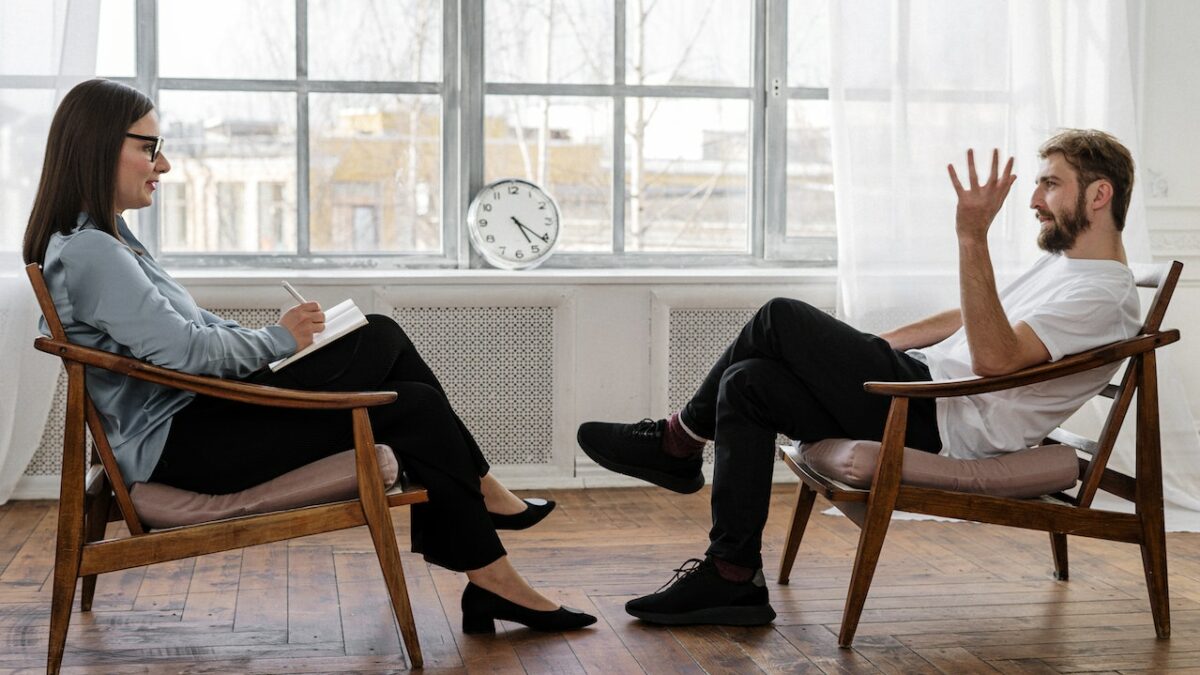 man talking to his counselor
