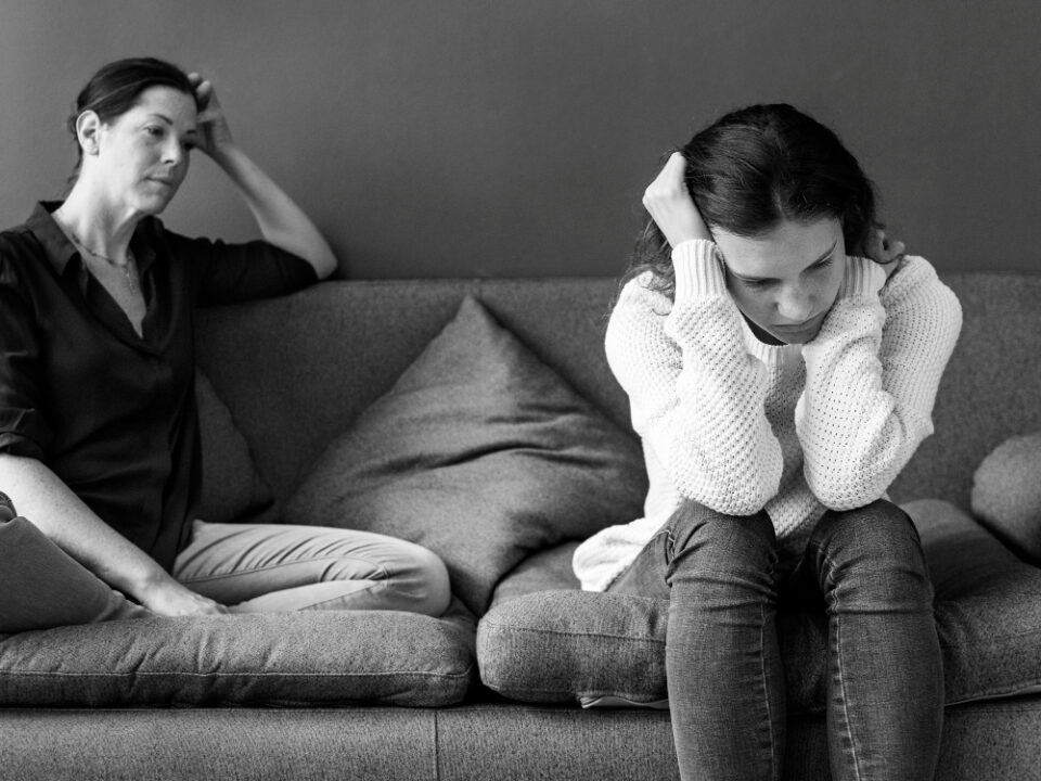 Woman trying to spot the early signs of substance abuse in a family member